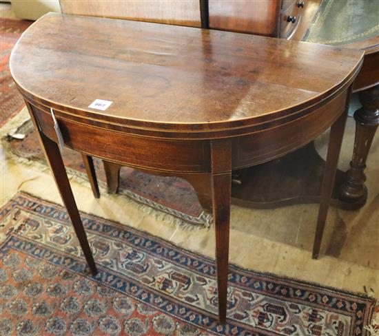 George III mahogany D-shaped folding card table